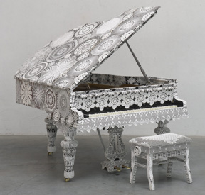 Piano covered in crochet medium