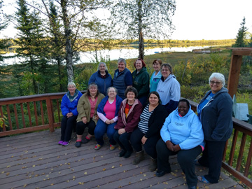 Group photo by lake